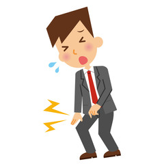 膝の痛み　ビジネスマン