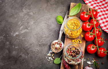 Fototapeta na wymiar Ingredients for cooking, spice and cherry tomatoes.