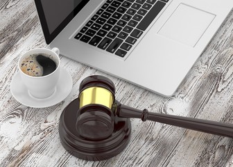 Gavel, laptop and coffee
