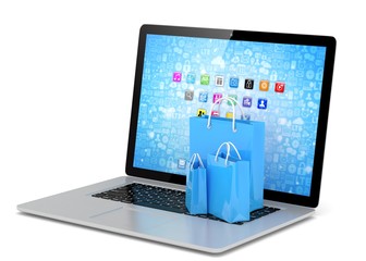 laptop and  shopping pags on white background