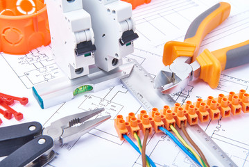 Components for use in electrical installations. Cut pliers, connectors, fuses and wires. Accessories for engineering work, energy concept.