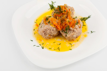 Three Meatballs on a white plate
