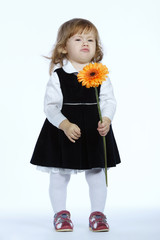 sweet sad girl with flower