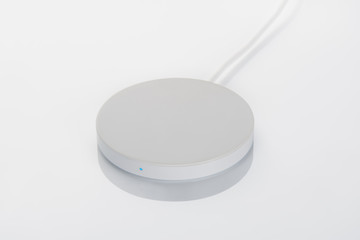 Wireless charger isolated on white background. Accessory for smartphone or tablet.