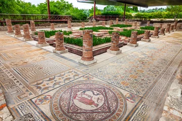Deurstickers House of the Fountains in Conimbriga. View of the very ornate mosaics, peristyle, garden and pond. Conimbriga in Portugal, is one of the best preserved Roman cities on the west of the empire. © StockPhotosArt