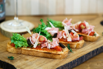 toasted bread slice with smoked ham and cheese