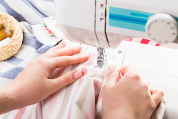 Obraz na płótnie Canvas Close-up of working sewing machine