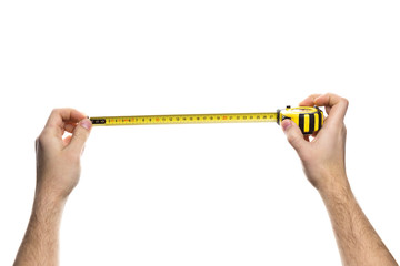 Hands holding measuring tape