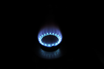 Burning gas burner in the darkness