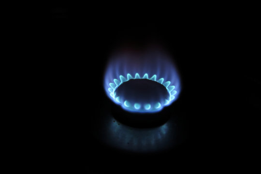Burning gas burner in the darkness