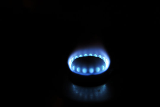 Burning gas burner in the darkness