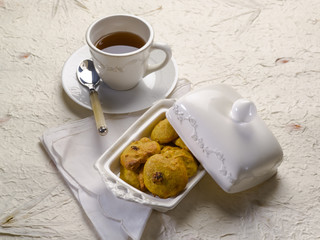 tea and cookie with dried grape 