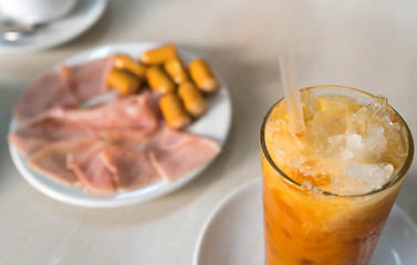 ice milk tea , blur ham and sausage background