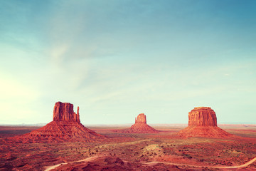 Retro toned Monument Valley at sunset, USA