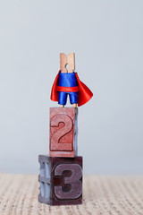 Clothespin Superhero on a pedestal