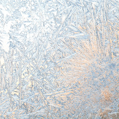 Frozen glass. Ice flowers. Frost flowers. Window frost. Winter in the window. Frozen window. Macro....