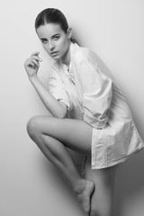 woman in fashion studio shoot. black and white