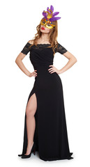 Young woman in black gown on white.