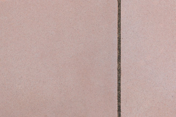 Fototapeta premium Texture of soft pink color concrete wall.