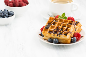 traditional sweet waffles with chocolate and berries