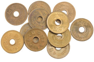 Pile of 5 yen coins japanese money.