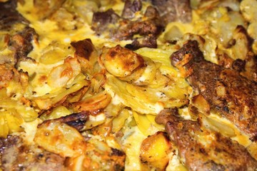 Gratin potato and pork with golden crust