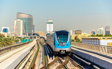Naklejka premium Metro train on the Red line in Dubai