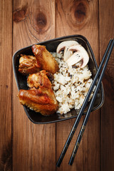 Rice with mushrooms and baked chicken wings