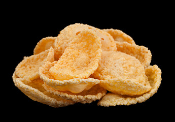 Corn flakes snack on black background