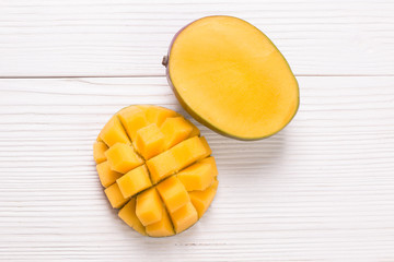 Fresh rip mango on a wooden background.Healthy food