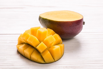 Fresh rip mango on a wooden background.Healthy food