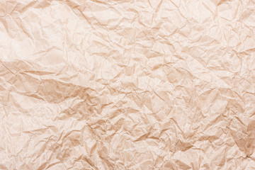 Brown crumpled paper background.