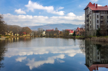 cottage village on the shore of a mountain lake