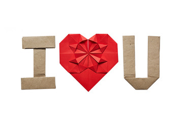 Origami text I LOVE YOU, U on white background isolated. Space for copy, lettering. Red paper heart. No shaddow.