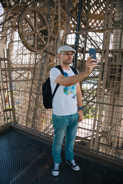 Selfie man inside the Eiffel Tower