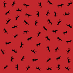 Wild horses on a red background