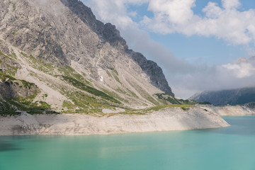 Summer Hiking Trip around a Lake in the Alps