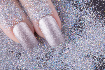 Silver nail polish.