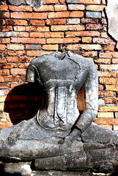 Destroyed buddha statue at Chaiwattanaram temple, Ayutthaya historical park,Thailand