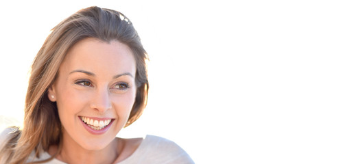 Portrait of cheerful natural woman with long hair