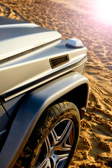 Detail of modern off-road luxury car details: fender and wheel