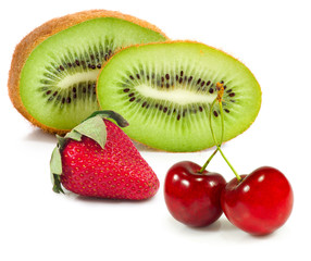 Isolated image of a kiwi and berries on a white background closeup