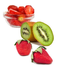 Isolated image of a kiwi and berries on a white background close-up