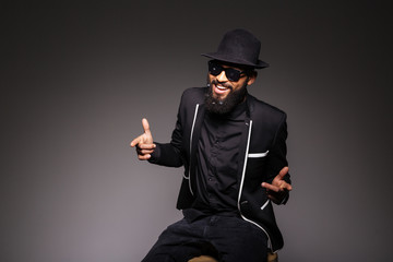 Cheerful afro american man in stylish cloth and glasses