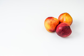 Nectarine friuts isolated on white background.