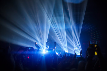 Silhouettes of people and musicians