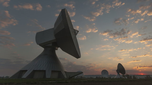 4K Time lapse close up Parabolic Antenna Sunrise
