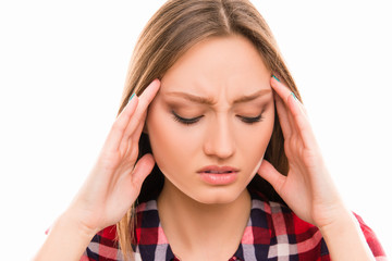 Attractive young girl suffering from strong headache