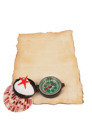 Old paper, compass and shells isolated on white background