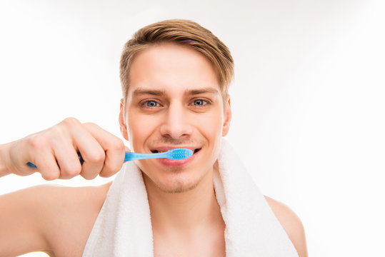 Healthcare. Handsome healthy man brushing tooth with toothbrush